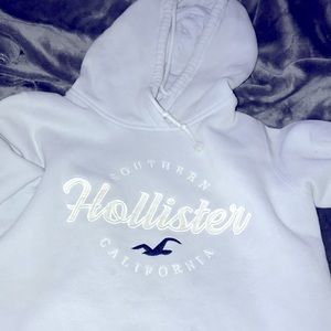 this is a hollister hoodie. it is a a light purple and in good shape